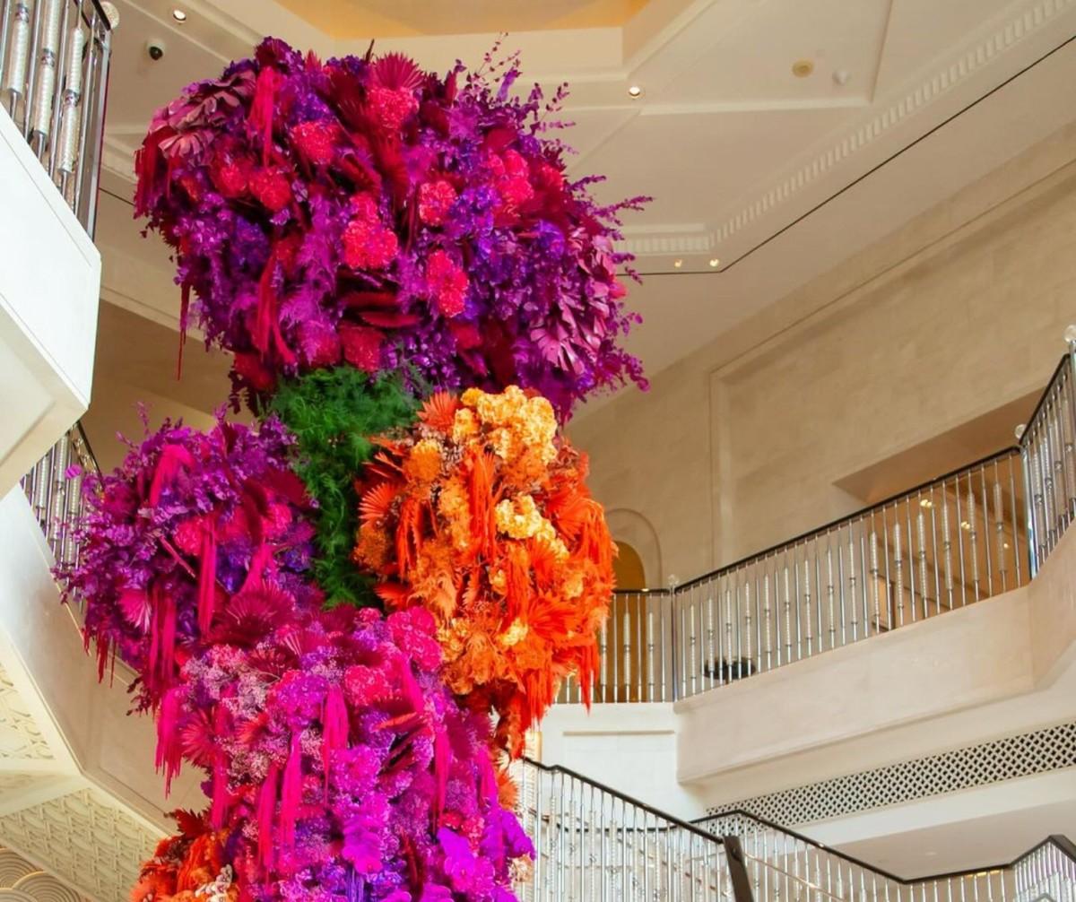 The Ambani's wedding florist creates massive floral installation in Dubai